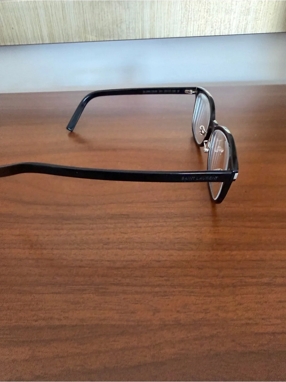 Saint Laurent Black Frames with Blue-Tinted Lenses